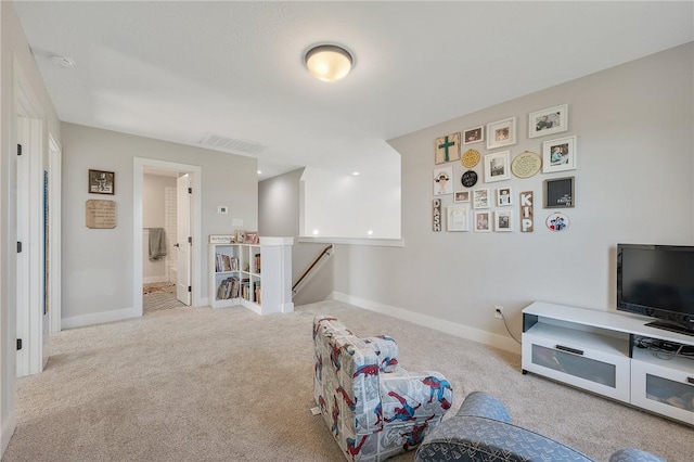 interior space featuring light colored carpet