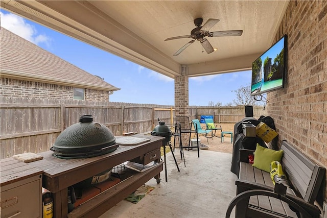 view of patio / terrace featuring a ceiling fan and a fenced backyard