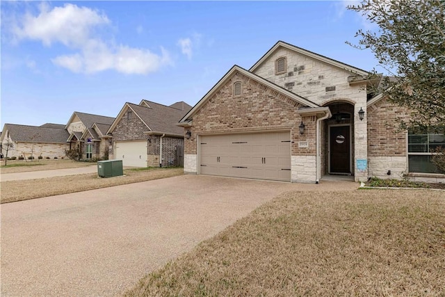 view of front facade featuring central AC unit, concrete driveway, stone siding, an attached garage, and brick siding