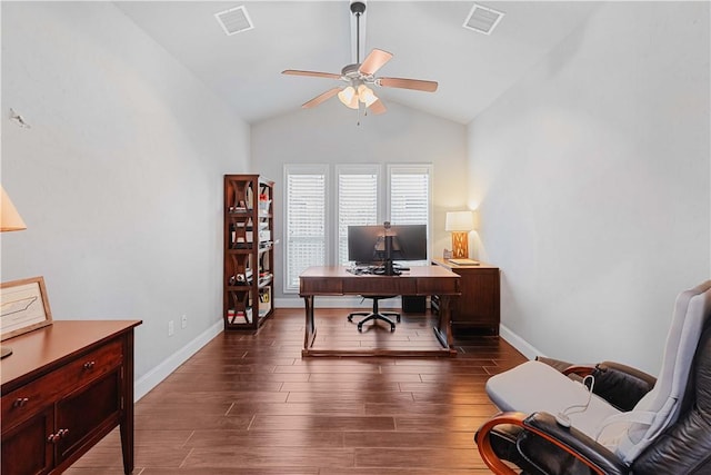 office area with a ceiling fan, vaulted ceiling, visible vents, and dark wood finished floors