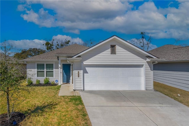 ranch-style house with a front yard, concrete driveway, a garage, and roof with shingles