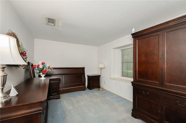 bedroom featuring light carpet, baseboards, and visible vents