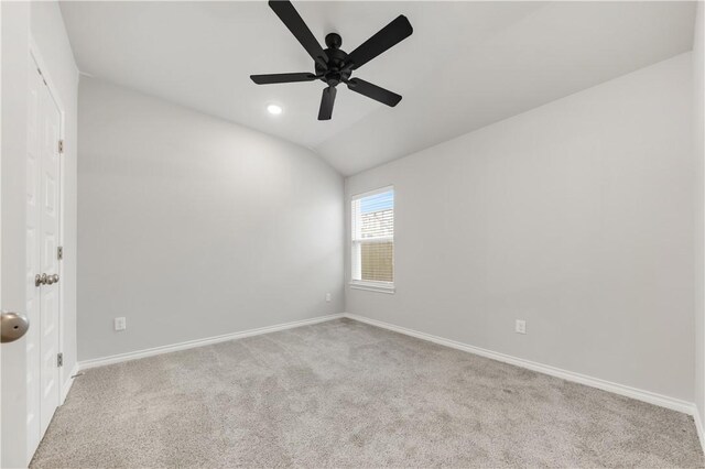 carpeted empty room with recessed lighting, baseboards, lofted ceiling, and ceiling fan