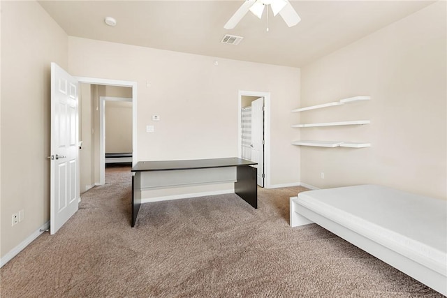 carpeted bedroom with ceiling fan and a baseboard radiator