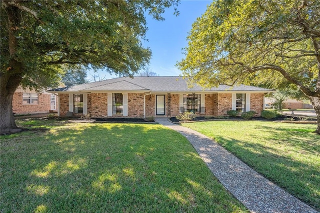 ranch-style home with a front yard