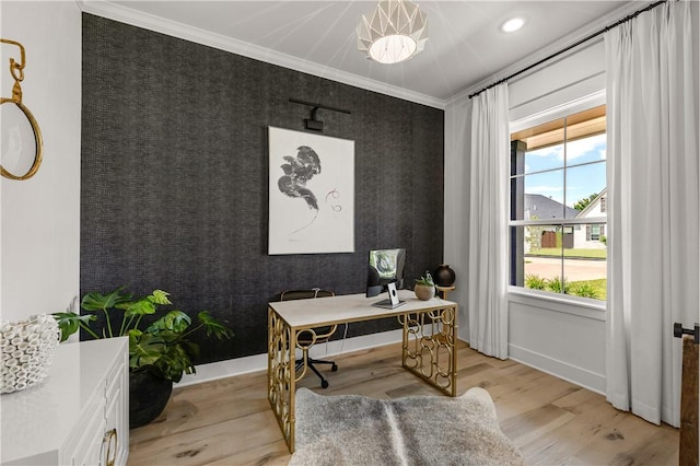 home office with crown molding, an inviting chandelier, and light hardwood / wood-style flooring