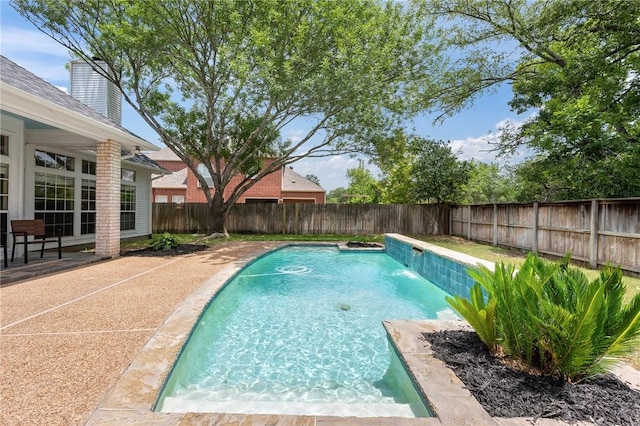 4719 Hunington Dr, Bryan, TX 77802 - view of swimming pool featuring a fenced backyard and a patio area