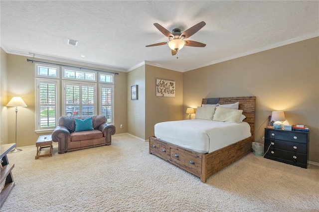 4719 Hunington Dr, Bryan, TX 77802 - bedroom featuring carpet floors, ornamental molding, and a ceiling fan