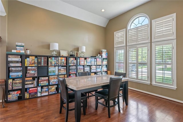 4719 Hunington Dr, Bryan, TX 77802 - dining room featuring plenty of natural light, wood finished floors, lofted ceiling, and recessed lighting