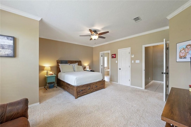 4719 Hunington Dr, Bryan, TX 77802 - carpeted bedroom featuring ornamental molding and ceiling fan
