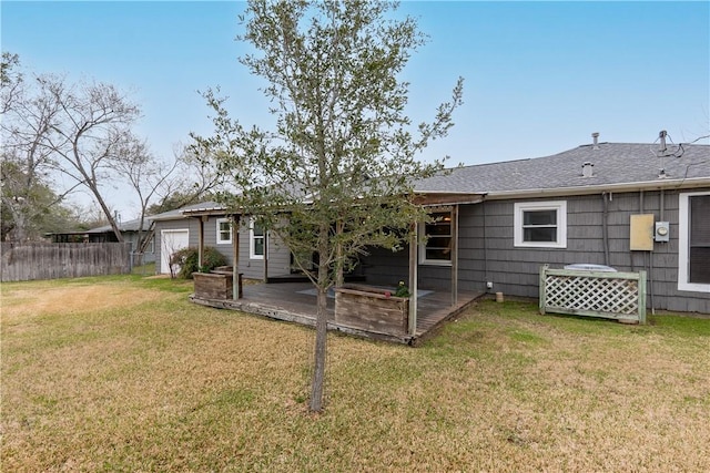 1002 Edgewood Dr, Bryan, TX 77802 - back of property featuring a wooden deck