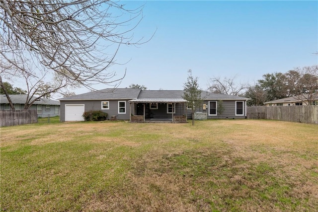 1002 Edgewood Dr, Bryan, TX 77802 - back of house featuring a garage