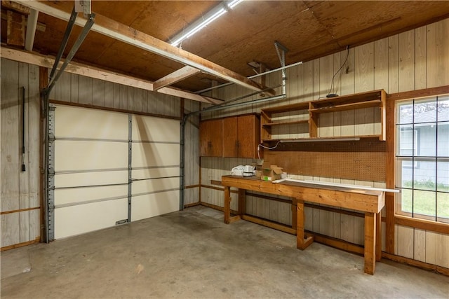 1002 Edgewood Dr, Bryan, TX 77802 - garage featuring wooden walls