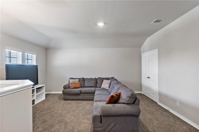 living room with carpet and lofted ceiling