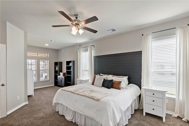 carpeted bedroom with ceiling fan