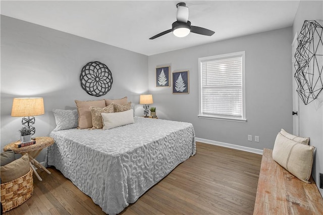 bedroom with hardwood / wood-style floors and ceiling fan