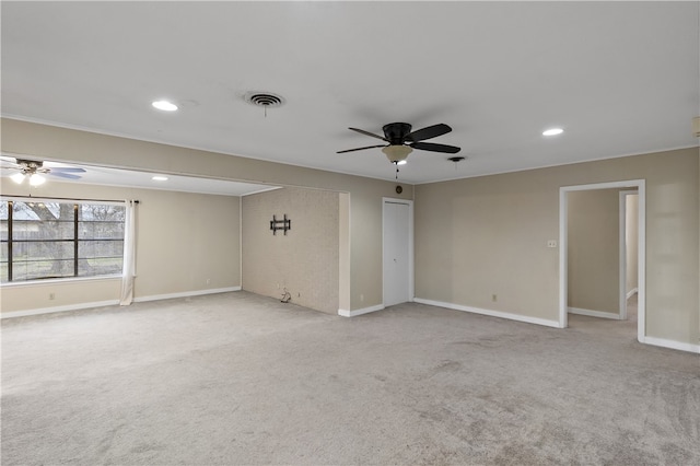 empty room with light carpet, baseboards, visible vents, a ceiling fan, and recessed lighting