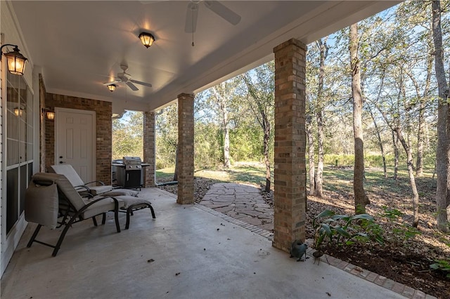 view of patio / terrace with grilling area and ceiling fan