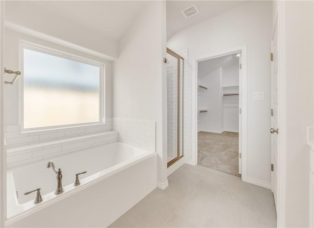 bathroom with plus walk in shower and tile patterned floors