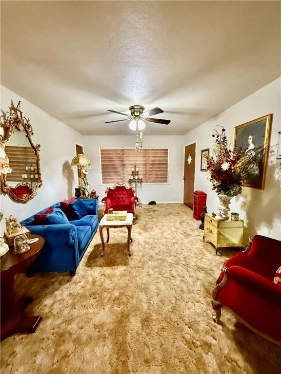 312 S 5th St, Crockett, TX 75835 - living area with a ceiling fan and carpet