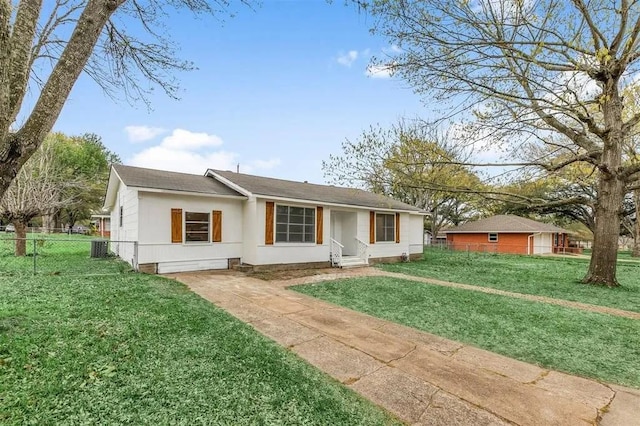 ranch-style home with a front lawn