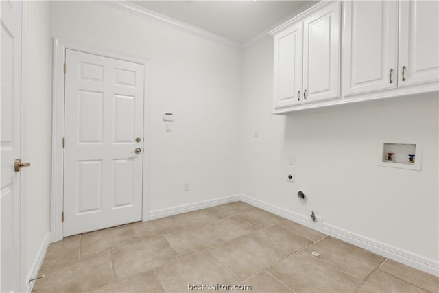 laundry room featuring electric dryer hookup, cabinets, hookup for a washing machine, ornamental molding, and light tile patterned floors