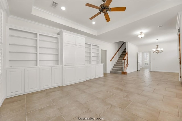 unfurnished living room featuring built in features, light tile patterned floors, ceiling fan with notable chandelier, and ornamental molding