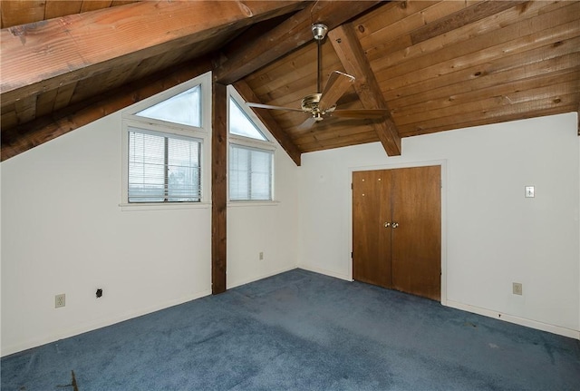 bonus room with vaulted ceiling with beams, dark carpet, ceiling fan, and wood ceiling