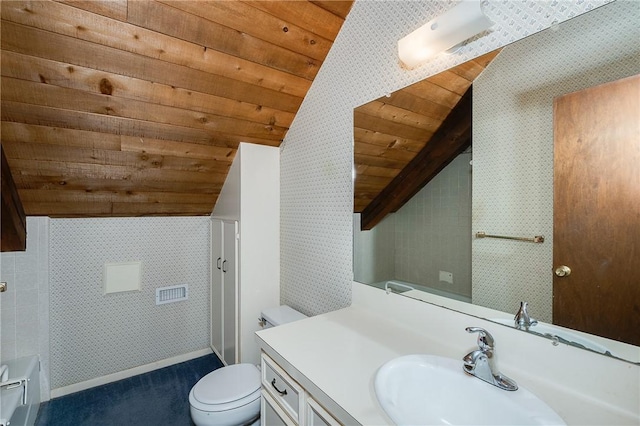 bathroom with vanity, wood ceiling, lofted ceiling, and toilet