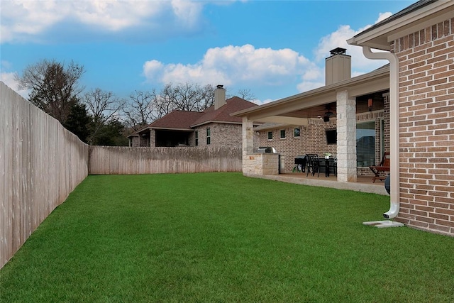 view of yard with a patio area