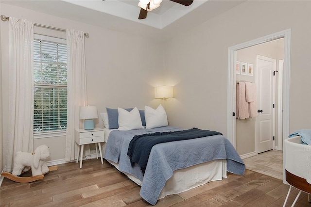 bedroom featuring ceiling fan and light wood-type flooring