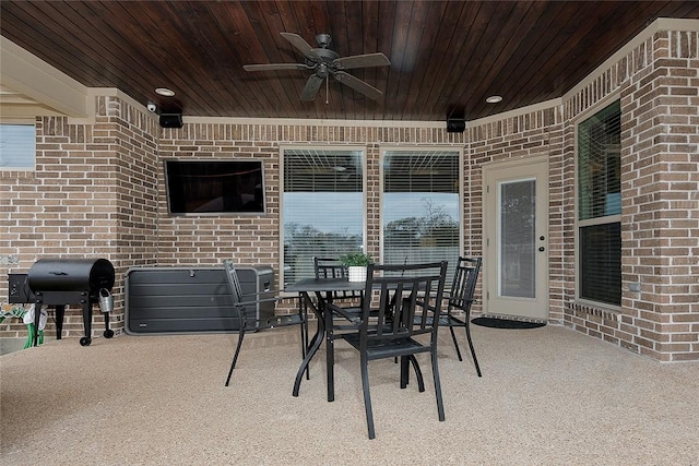 view of patio / terrace with area for grilling and ceiling fan