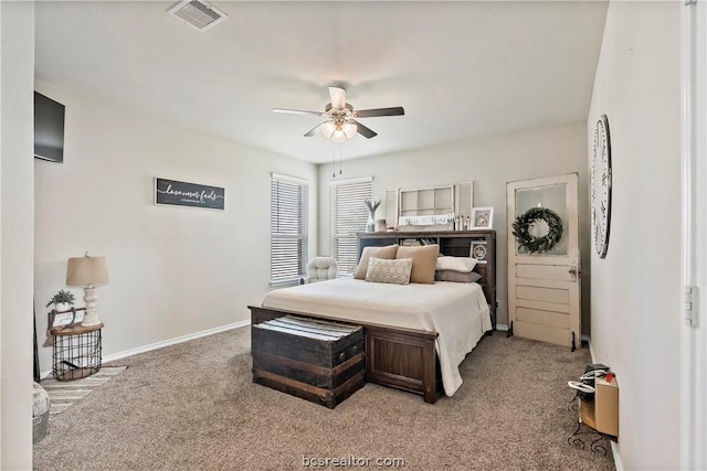 carpeted bedroom featuring ceiling fan