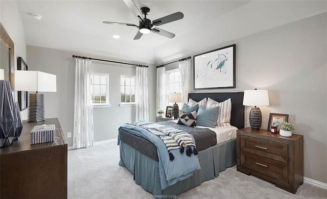 carpeted bedroom featuring ceiling fan