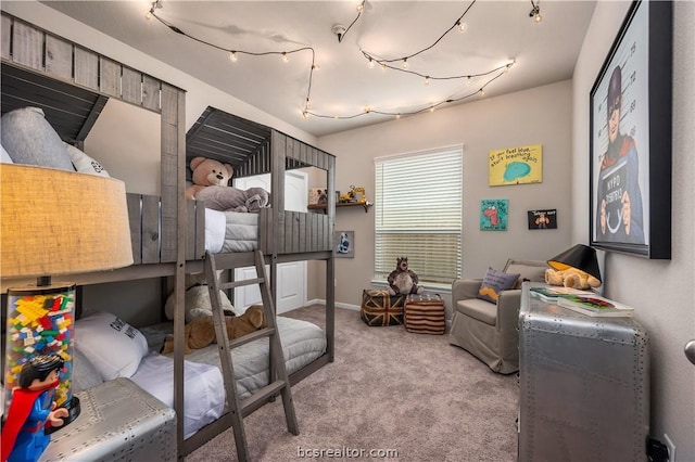 bedroom featuring light carpet