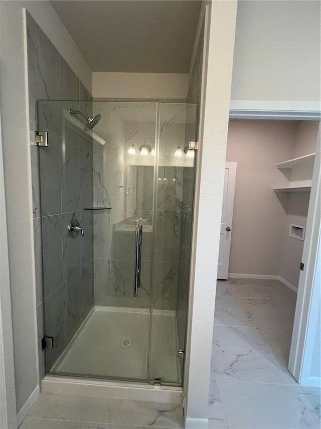 bathroom with an enclosed shower