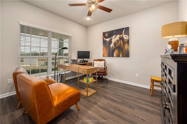 home office featuring dark hardwood / wood-style floors and ceiling fan