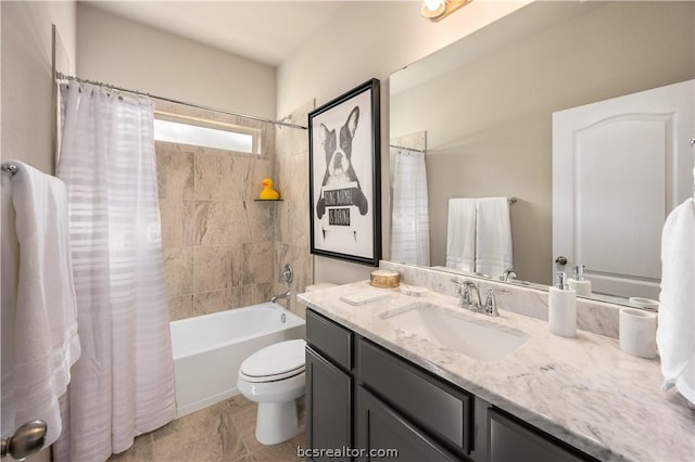 full bathroom featuring shower / tub combo, vanity, toilet, and tile patterned floors