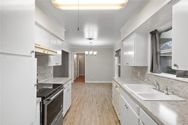 kitchen with an inviting chandelier, white cabinetry, electric range, under cabinet range hood, and a sink