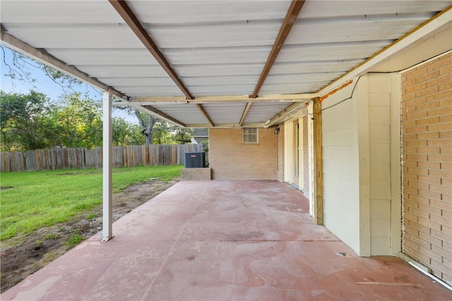 view of patio / terrace featuring fence