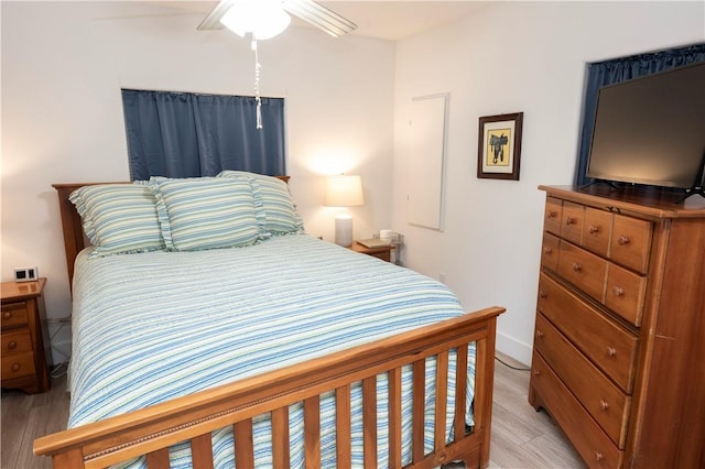 bedroom featuring ceiling fan and light wood-type flooring