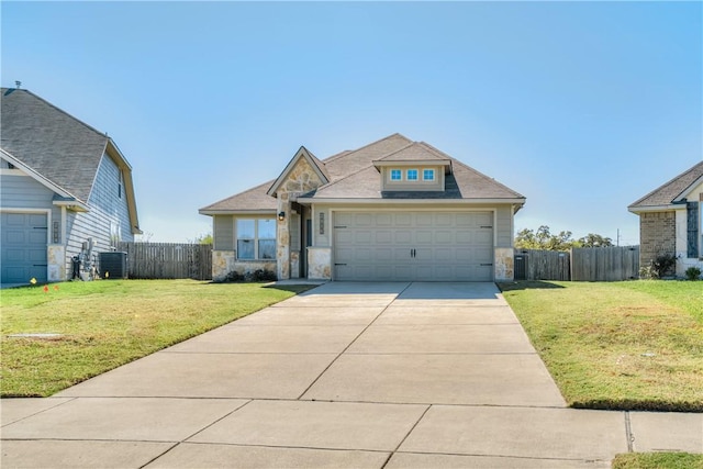 view of front of property featuring stone siding, concrete driveway, and a front lawn