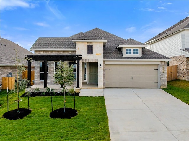 view of front of house with a pergola, a front lawn, and a garage