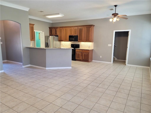 kitchen with backsplash, black appliances, light stone countertops, light tile patterned floors, and ornamental molding