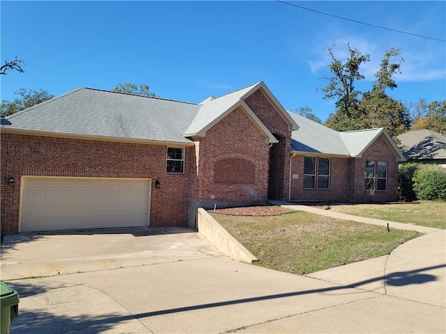 ranch-style house with a front lawn and a garage