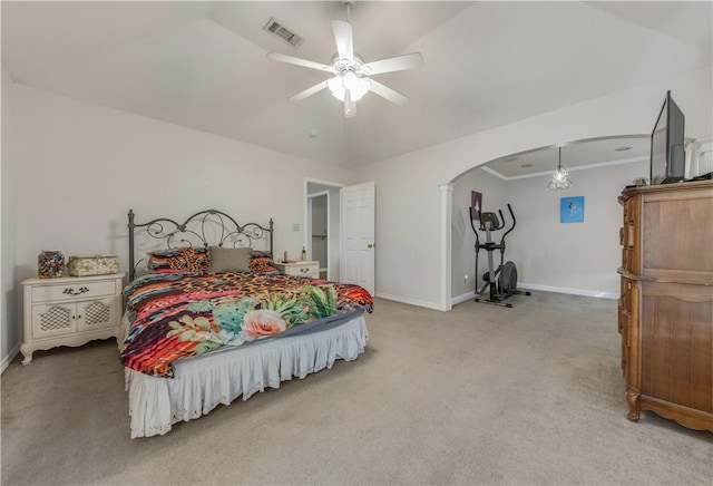 carpeted bedroom featuring ceiling fan and vaulted ceiling