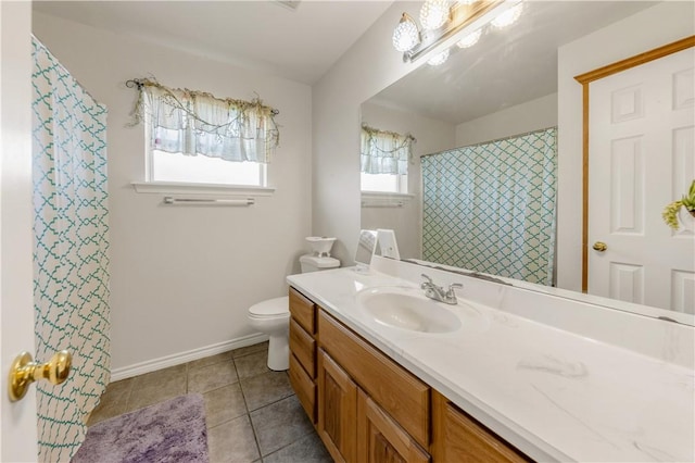 bathroom featuring tile patterned floors, vanity, a shower with shower curtain, and toilet