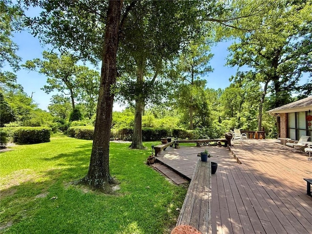 28 Sammy Snead Dr, Hilltop Lakes, TX 77871 - wooden terrace featuring a yard