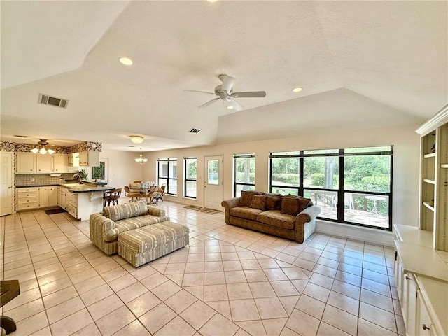 28 Sammy Snead Dr, Hilltop Lakes, TX 77871 - living area with a ceiling fan, lofted ceiling, light tile patterned floors, and recessed lighting