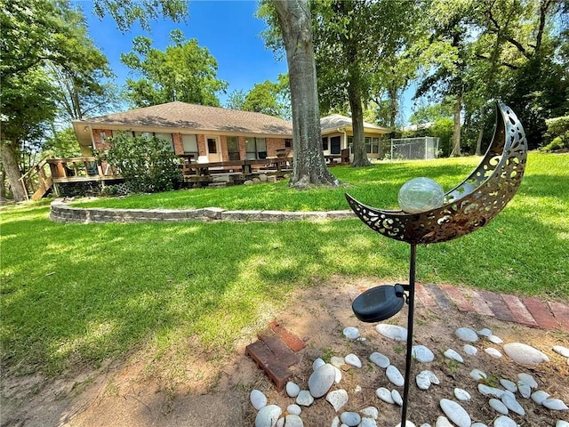28 Sammy Snead Dr, Hilltop Lakes, TX 77871 - view of yard with a deck